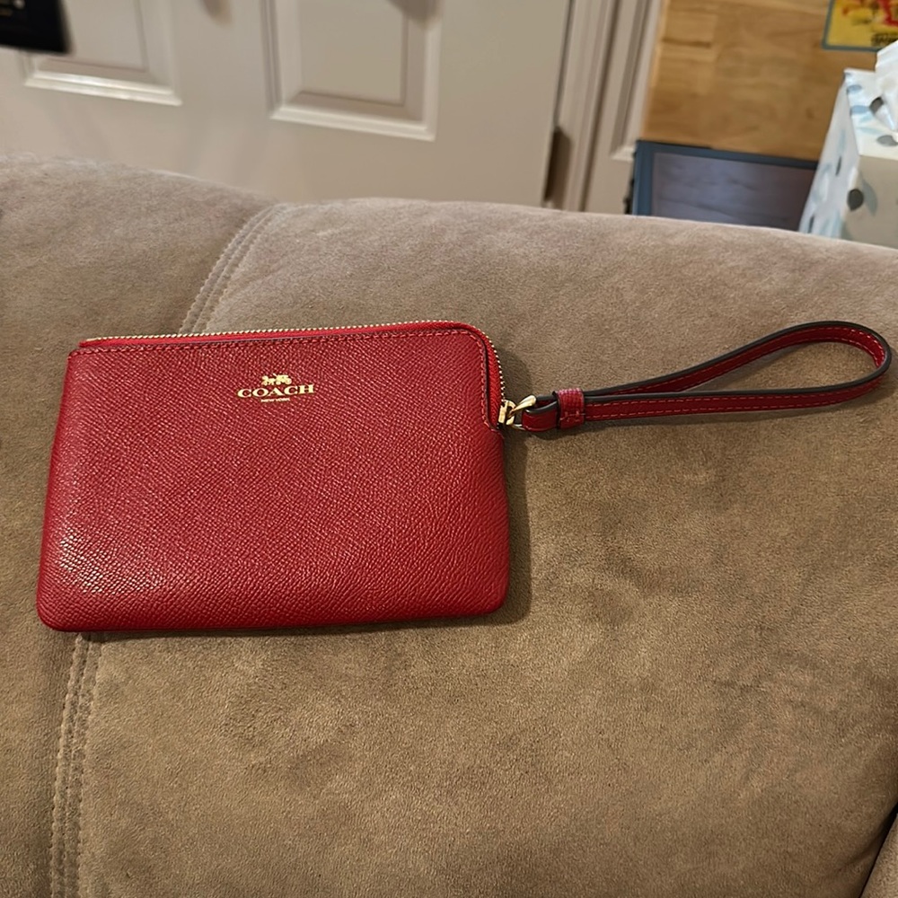 Small coach wristlet pouch.